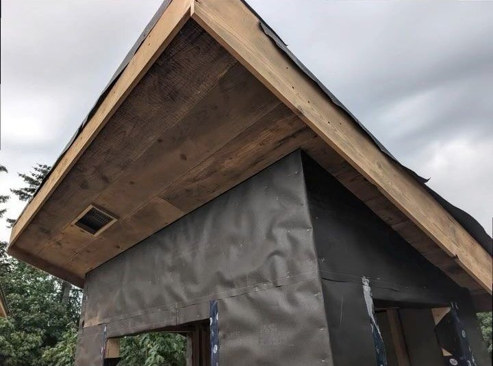 Finished cabin exterior with siding